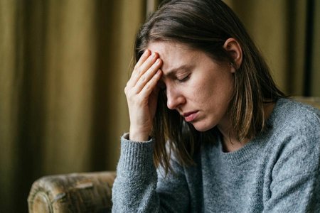 An image of the word ache as defined by to have or suffer a continuous, dull pain.