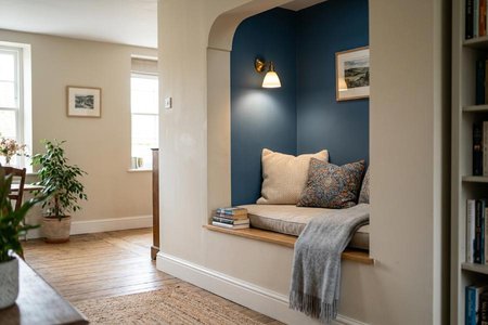 An image of the word alcove as defined by a recess or small room adjacent to or opening out of a room.