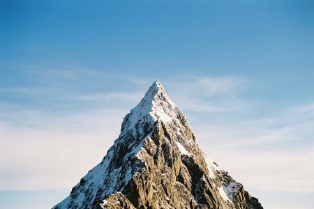 An image of the word apex as defined by the tip, point, or vertex; summit.