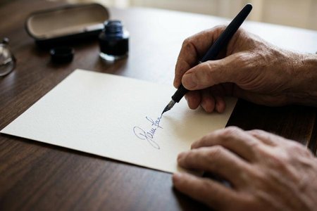 An image of the word autograph as defined by a person's own signature.