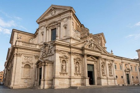 An image of the word baroque as defined by of or relating to a style of architecture and art originating in Italy in the early 17th century and variously prevalent in Europe and the New World for a century and a half, characterized by free and sculptural use of the classical orders and ornament, by forms in elevation and plan suggesting movement, and by dramatic effect in which architecture, painting, sculpture, and the decorative arts often worked to combined effect.