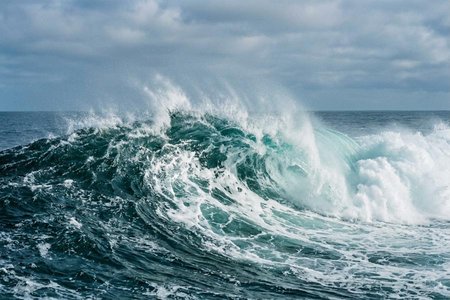 An image of the word billow as defined by a great wave or surge of the sea.
