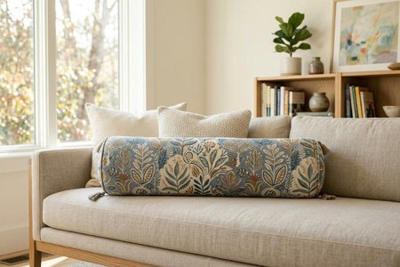 An image of the word bolster as defined by a long, often cylindrical, cushion or pillow for a bed, sofa, etc.
