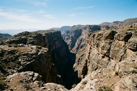An image of the word chasm as defined by a yawning fissure or deep cleft in the earth's surface; gorge.