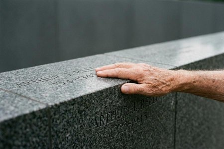 An image of the word commemorate as defined by to serve as a memorial or reminder of.