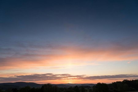 An image of the word dawn as defined by the first appearance of daylight in the morning.