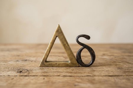 An image of the word delta as defined by the fourth letter of the Greek alphabet (Δ, δ).
