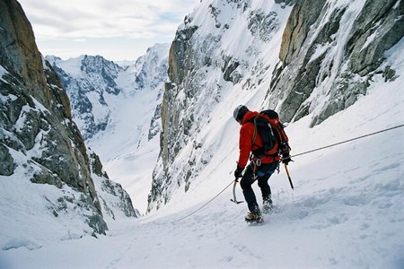 An image of the word descent as defined by the act, process, or fact of moving from a higher to a lower position.