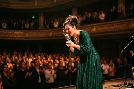 An image of the word diva as defined by a distinguished female singer; prima donna.