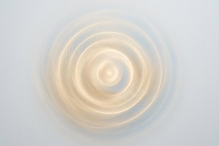 An image of the word emanate as defined by to flow out, issue, or proceed, as from a source or origin; come forth; originate.