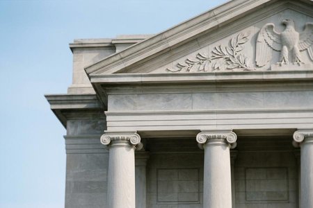 An image of the word federal as defined by pertaining to or of the nature of a union of states under a central government distinct from the individual governments of the separate states, as in