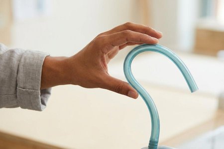 An image of the word flexible as defined by capable of being bent, usually without breaking; easily bent.