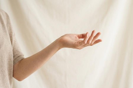 An image of the word gesture as defined by a movement or position of the hand, arm, body, head, or face that is expressive of an idea, opinion, emotion, etc..