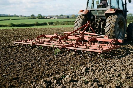 An image of the word harrow as defined by an agricultural implement with spikelike teeth or upright disks, drawn chiefly over plowed land to level it, break up clods, root up weeds, etc.