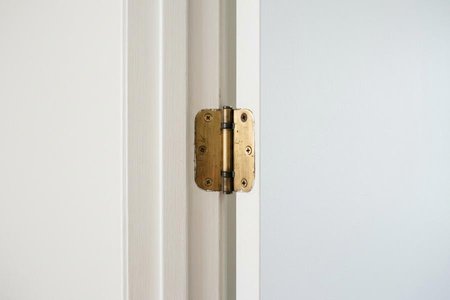 An image of the word hinge as defined by a jointed device or flexible piece on which a door, gate, shutter, lid, or other attached part turns, swings, or moves.