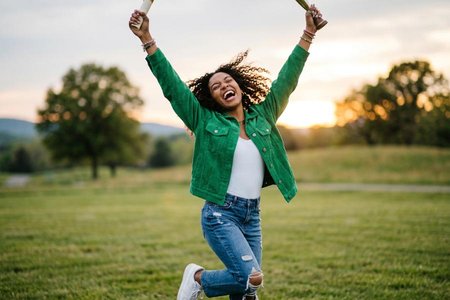 An image of the word jubilant as defined by feeling or showing great joy, satisfaction, or triumph; rejoicing; exultant.