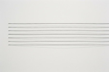 An image of the word linear as defined by of, consisting of, or using lines.