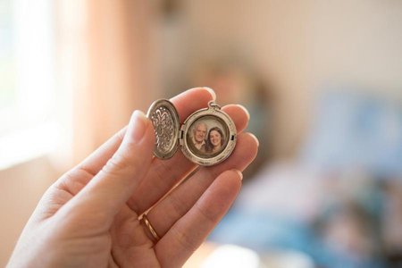 An image of the word memento as defined by an object or item that serves to remind one of a person, past event, etc.; keepsake; souvenir.