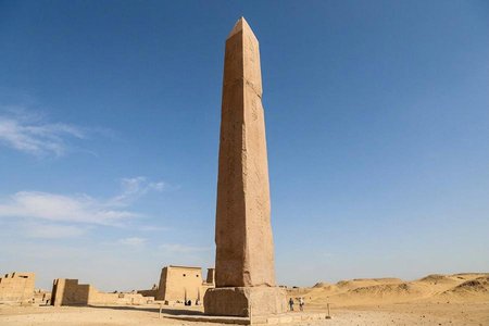 An image of the word monolith as defined by an obelisk, column, large statue, etc., formed of a single block of stone.