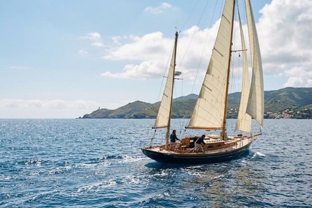 An image of the word nautical as defined by of or relating to sailors, ships, or navigation.