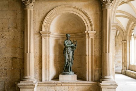 An image of the word niche as defined by an ornamental recess in a wall or the like, usually semicircular in plan and arched, as for a statue or other decorative object.
