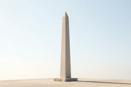 An image of the word obelisk as defined by a tapering, four-sided shaft of stone, usually monolithic and having a pyramidal apex.