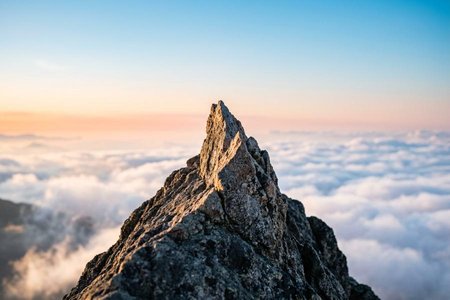 An image of the word pinnacle as defined by a lofty peak.