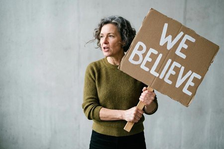 An image of the word slogan as defined by a distinctive cry, phrase, or motto of any party, group, manufacturer, or person; catchword or catch phrase.