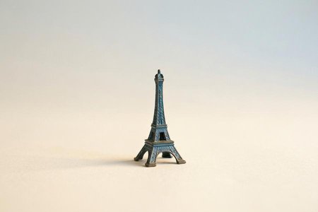 An image of the word souvenir as defined by a usually small and relatively inexpensive article given, kept, or purchased as a reminder of a place visited, an occasion, etc.; memento.