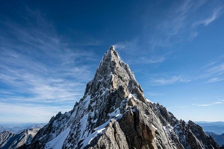 An image of the word summit as defined by the highest point or part, as of a hill, a line of travel, or any object; top; apex.