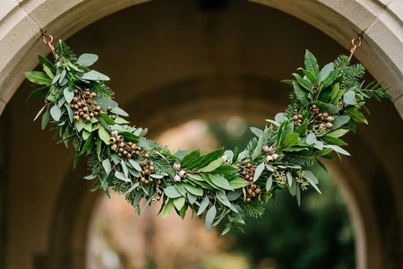 An image of the word swag as defined by a suspended wreath, garland, drapery, or the like, fastened up at or near each end and hanging down in the middle; festoon.