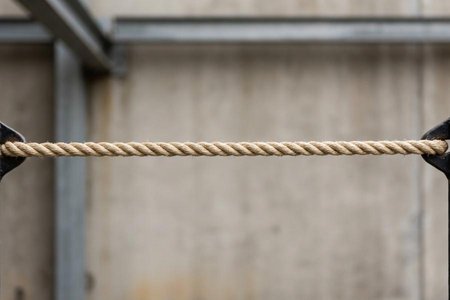 An image of the word taut as defined by tightly drawn; tense; not slack.