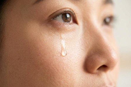 An image of the word tear as defined by a drop of the saline, watery fluid continually secreted by the lacrimal glands between the surface of the eye and the eyelid, serving to moisten and lubricate these parts and keep them clear of foreign particles.