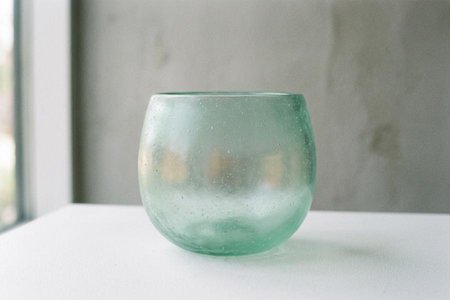 An image of the word translucent as defined by permitting light to pass through but diffusing it so that persons, objects, etc., on the opposite side are not clearly visible.